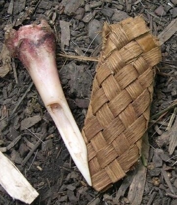 Actual image of another bone knife and it's woven sheath