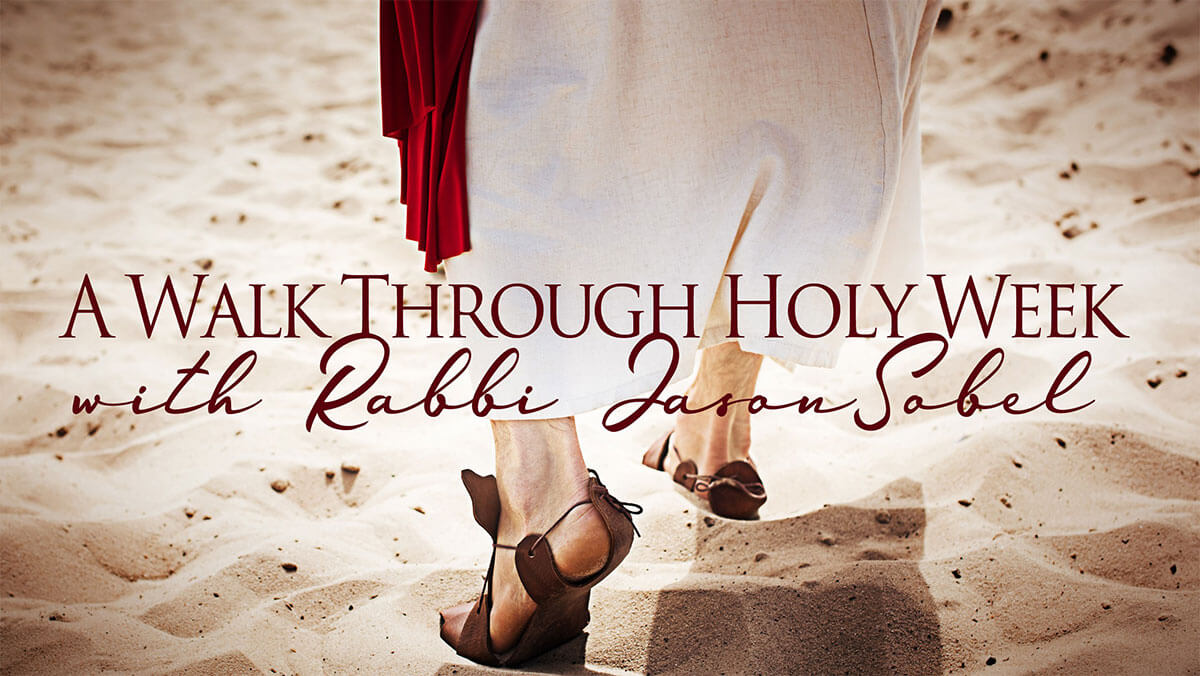 A Walk Through Holy Week with Rabbi Jason Sobel poster, featuring a white-robed figure walking away from the camera, wearing sandals in the sand.